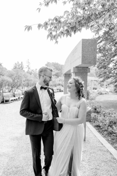 Bride and groom walk up memorial steps at their DC wedding