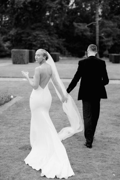 bride and groom wearing a tuxedo photo taken at a destination wedding in italy