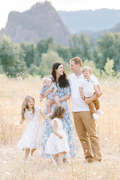 Erica Gray and her husband Javan  with their kids at their home.