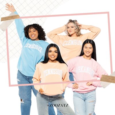 Four ZooZatz models wearing pastel colored crewneck sweatshirts