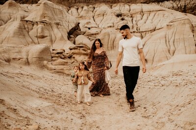 family walking in desert