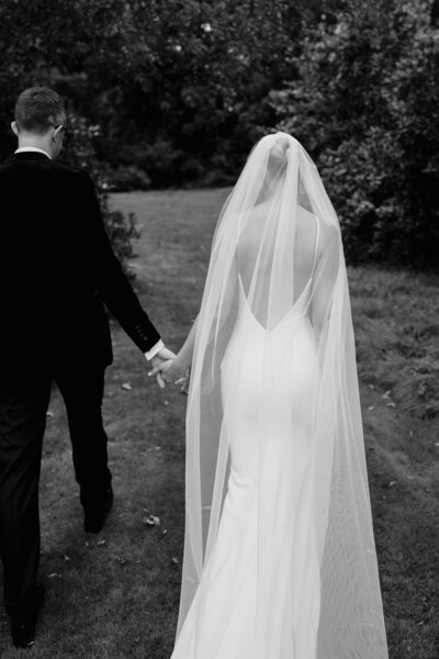 bride and groom wearing a tuxedo photo taken at a destination wedding in italy