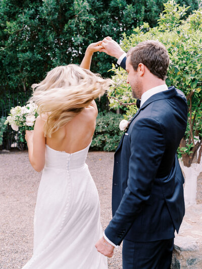 A stunning private estate wedding reception with guests mingling poolside. Captured in fine art luxury wedding photography for a timeless, elegant celebration.