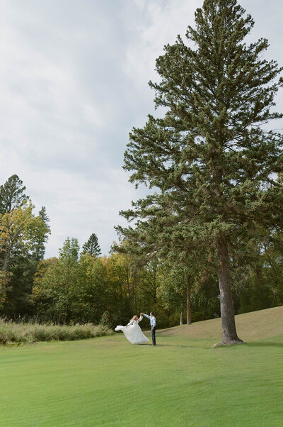 bride and groom do their celebration walking
