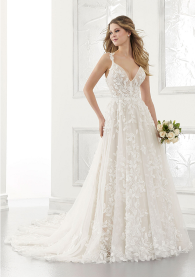 A perfect blend of classic and romantic, the Avonlea designer wedding dress features frosted, medallion style and geometric embroidery that create a beautiful shape on the Net mermaid silhouette. Detachable bishop sleeves add a touch of trend and provide the option of two looks in one. A gorgeous scalloped train edged in lace completes the look. Beaded Spaghetti Straps also included. Available in three lengths: 55″, 58″, 61″. Shown in Ivory/Sand Honey.