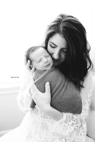 black and white picture of mom and baby boy