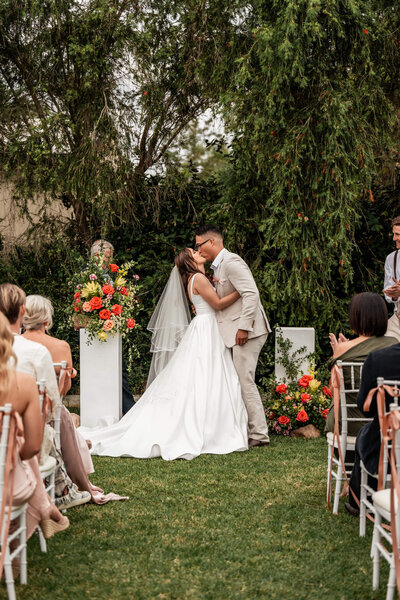bride in wedding gown holding bouquet - Townsville Wedding Photography by Jamie Simmons