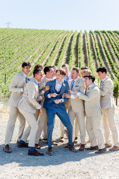 Murrietas Well Livermore Wedding - Vineyard groomsmen photos