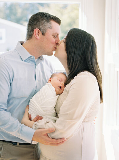 newborn and parents taken by a boston newborn photographer