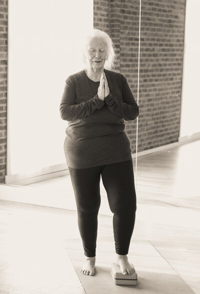 lady doing prayer pose