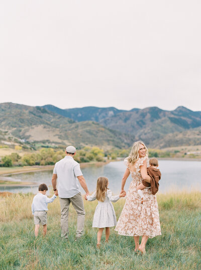 Family walking in mountains during Greenville photo session