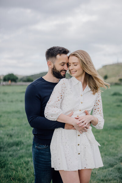 engaged-couple-hugging-in-cashel