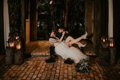 Bride and Groom posing for their bridal portraits at the Delamater House wedding venue in Orlando florida