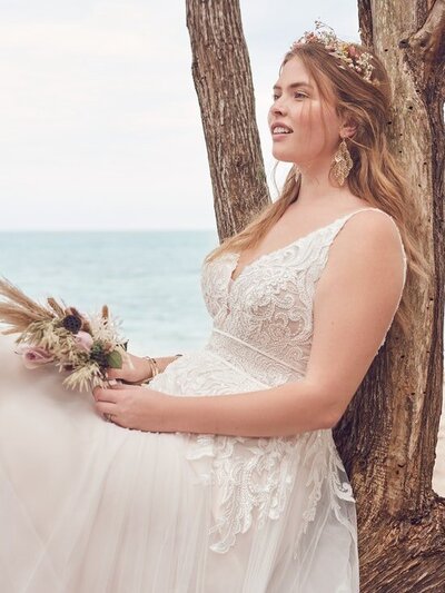 Plus size bridal gown with plunging neckline