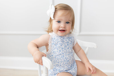 Baby girl on beanbag in studio