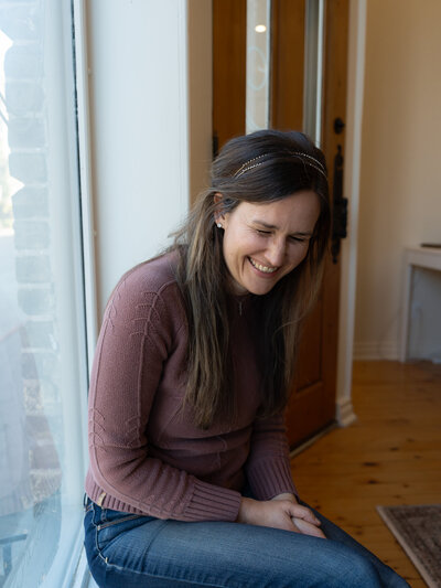 Jasmin sitting criss cross