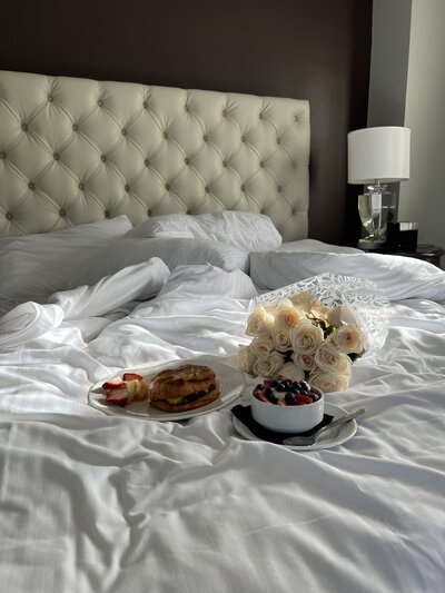 early morning breakfast on luxury hotel bed in DC
