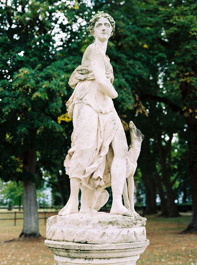 Large stone statue in venue gardens