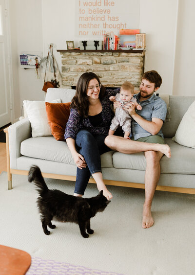 Austin family photography session with parents and baby and black cat