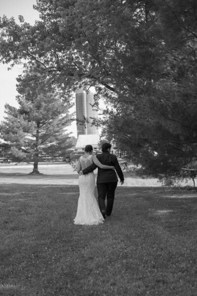 Couple standing in golden sunset light during Nashville wedding