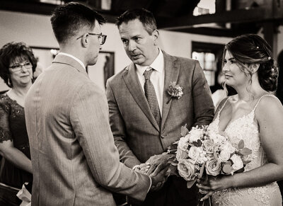 Bride shares emotional embrace with father before ceremony – tearful wedding moment captured in NJ