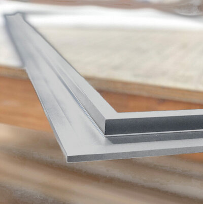 Silver Standard Flush Box Cleat example of framing hardware three quarter angle extending from table where it is placed