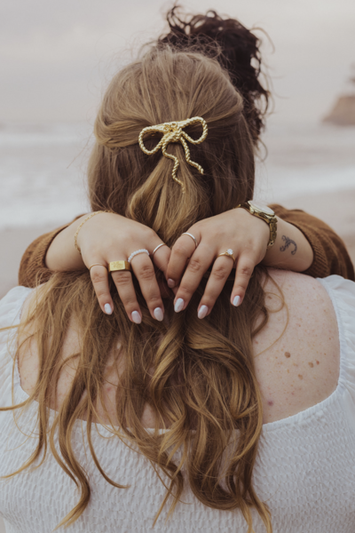 lesbian engagement session with a peachy filmy cinematic editing style