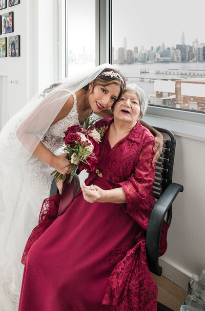 bride-with-her-mother-dressed-min-red-gown