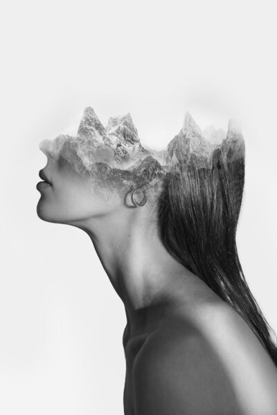 side-view-woman-mountains-double-exposure