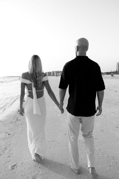 A couple’s beautiful beachfront engagement photographed in West Palm Beach FL captured by Priscila Del Cristo.
