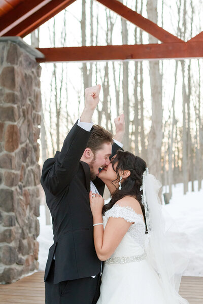 victorious-bride-and-groom-winter-wedding-poconos-pennsylvania