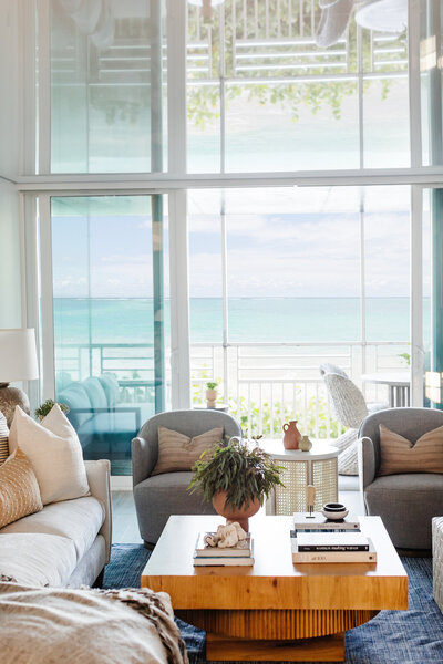 Coastal styled living room  with wooden table