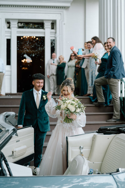Nashville bride and groom vintage car send off at historic Cherokee Dock in Nashville, Tennessee
