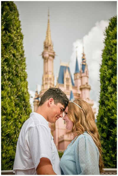Disney Engagement Photography in front of Cinderellas Castle