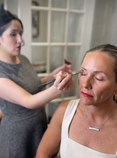 Fairfax Virginia Makeup Artist putting makeup on a client