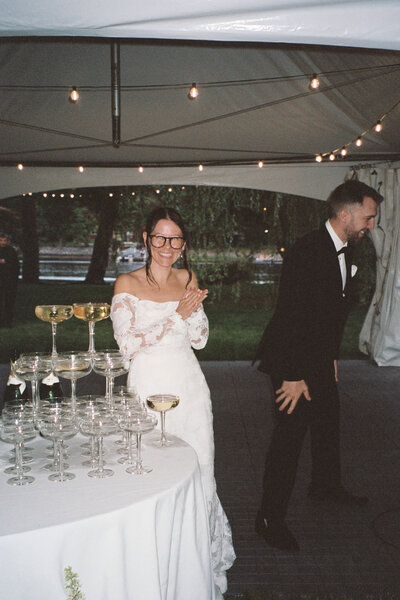 A bride and groom laughing documented by a Sudbury Documentary Photographer