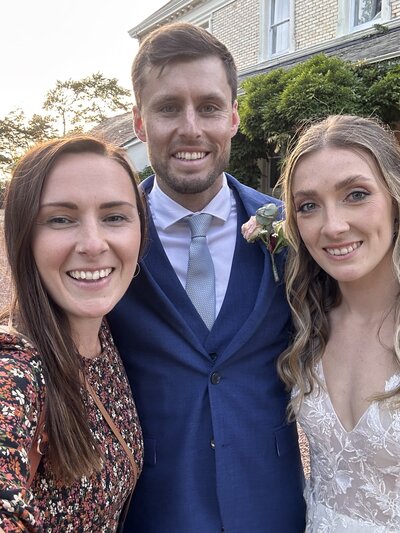 Amy & Nick posing with couple