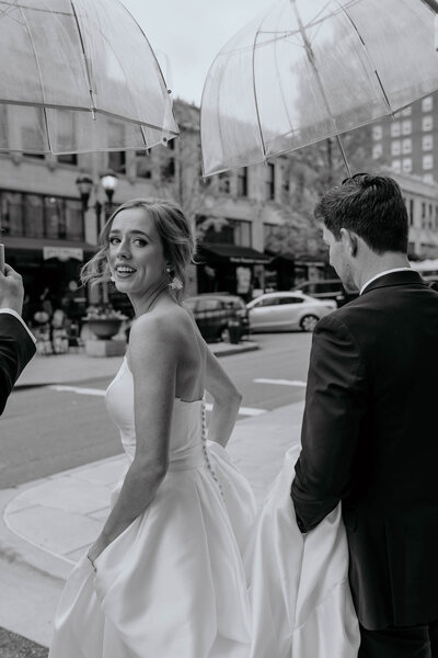 couple in rain wedding photo