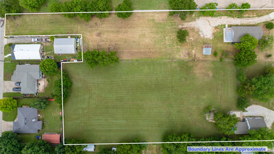 Aerial view of 2.68 acres with multiple access points off Hwy 82 and Cross St