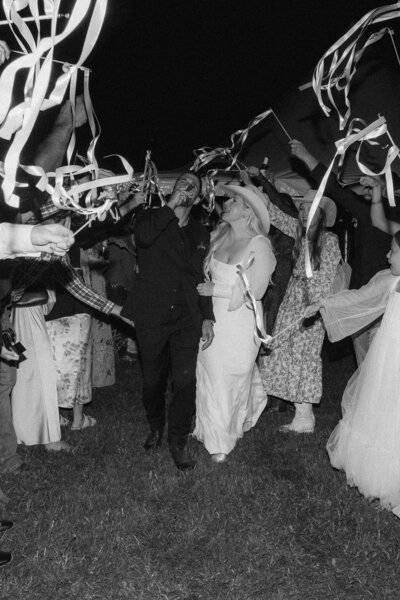 bride and groom hugging after jackson hole elopement at the national museum of wildlife art taken by adrian wayment photo