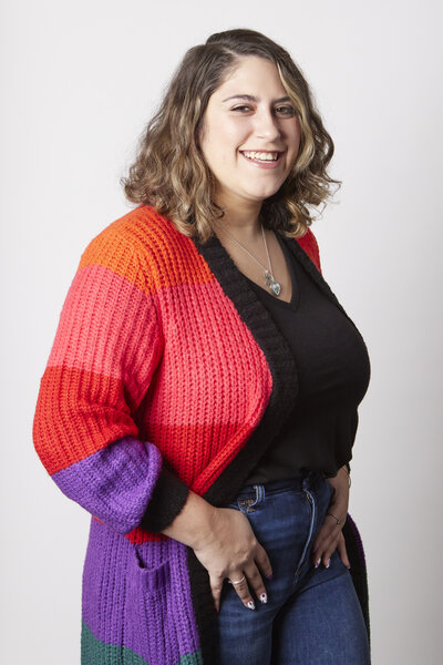 Headshot of Kevin Curry, creator consultant at Bird Hill PR, smiling in a blue sweatshirt against a light background.