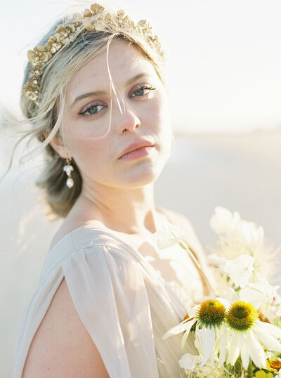 Golden floral bridal hairpiece, by Joanna Bisley Designs, romantic and modern wedding jewelry based in Calgary, Alberta.  Featured on the Brontë Bride Vendor Guide.