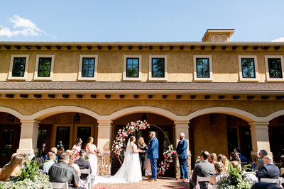 Bride and Groom standing in prom pose on their wedding day at Gervasi Vineyard photographed by akron ohio wedding photographer