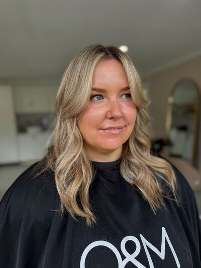 Woman touching her long hair