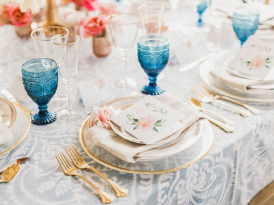 Photography by Beth Sheridan of an elegant wedding table place setting.