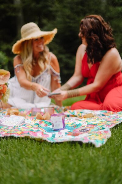 Spiritual entrepreneur coach Katie Sol, bonding with friends, sharing joy and connection.