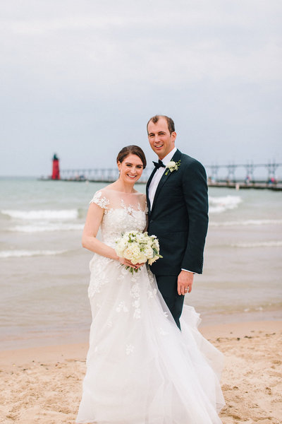 bride and groom on South Haven beach