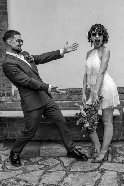 bride and groom posing be Severndroog castle London