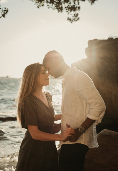 engaged couple at sunset in country fields of rural NSW