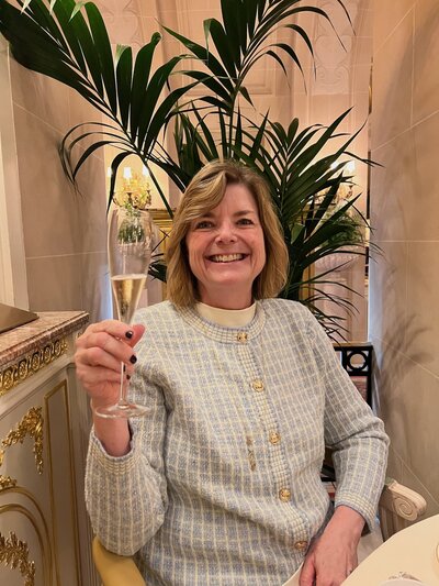 Photo of Kelly with Champagne